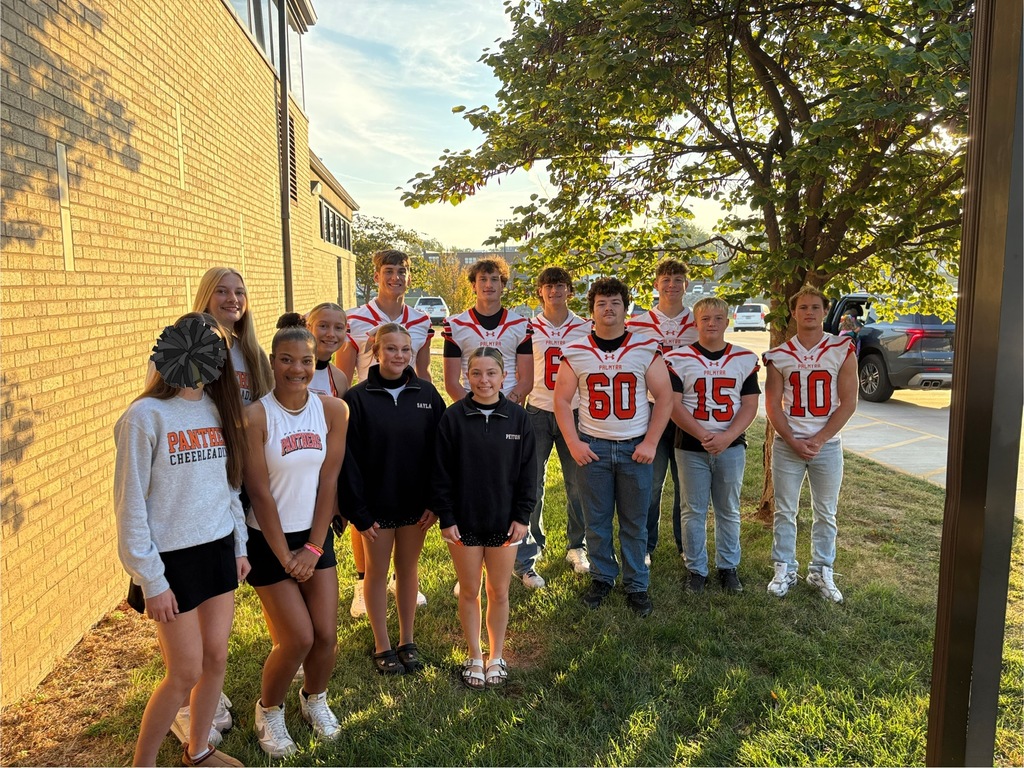 PHS athletes greeting kids at PES morning dropoff