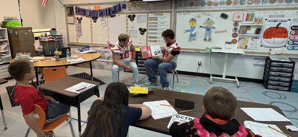 Football reads to ES classrooms