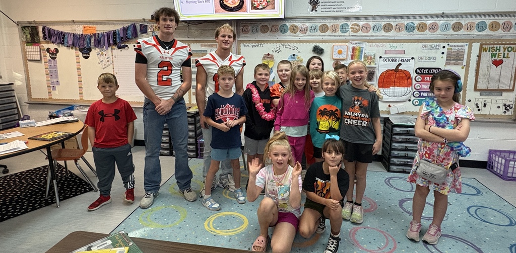 Football reads to ES classrooms