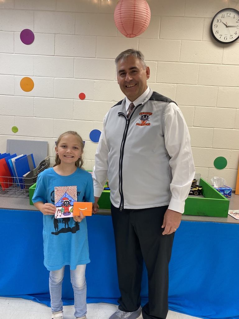 Zyler and Mr Harper with annual Christmas card runner up entry