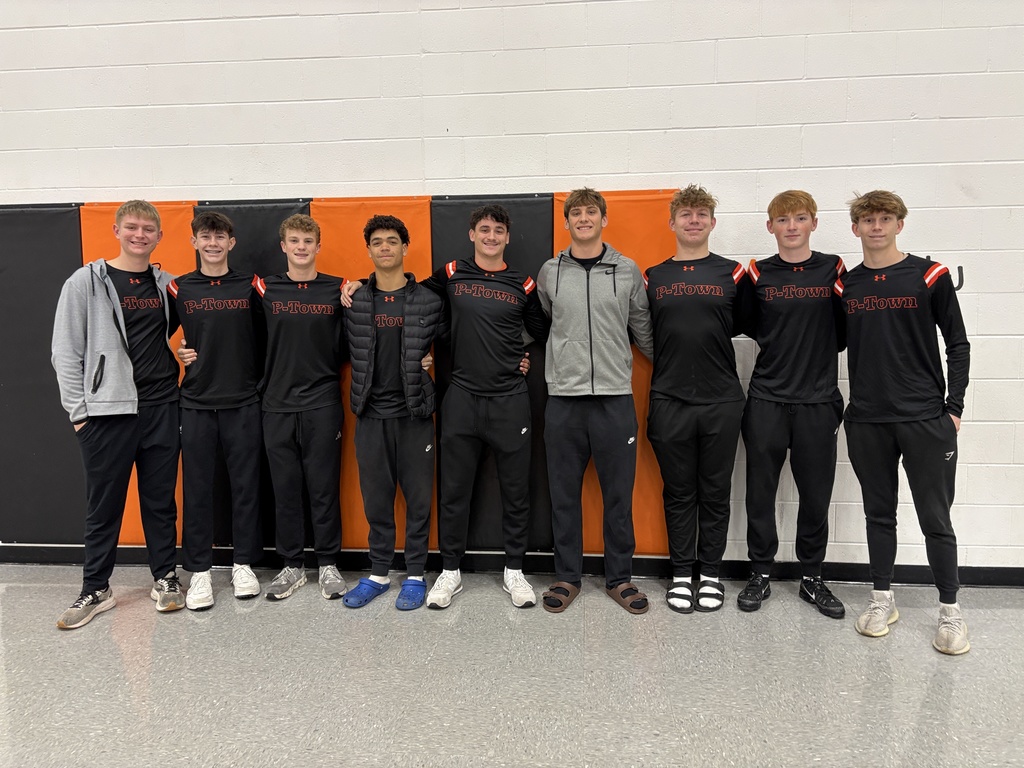 PHS baskeball in morning assembly with students at PES