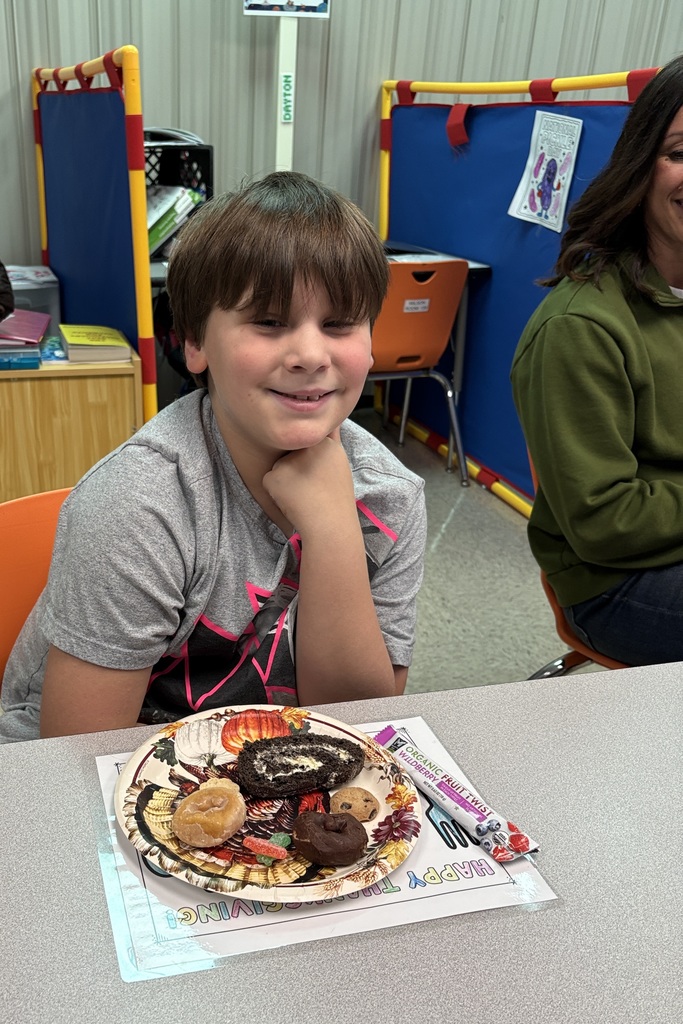 Ms Wilson's students enjoy classroom friendsgiving with their favorite treats