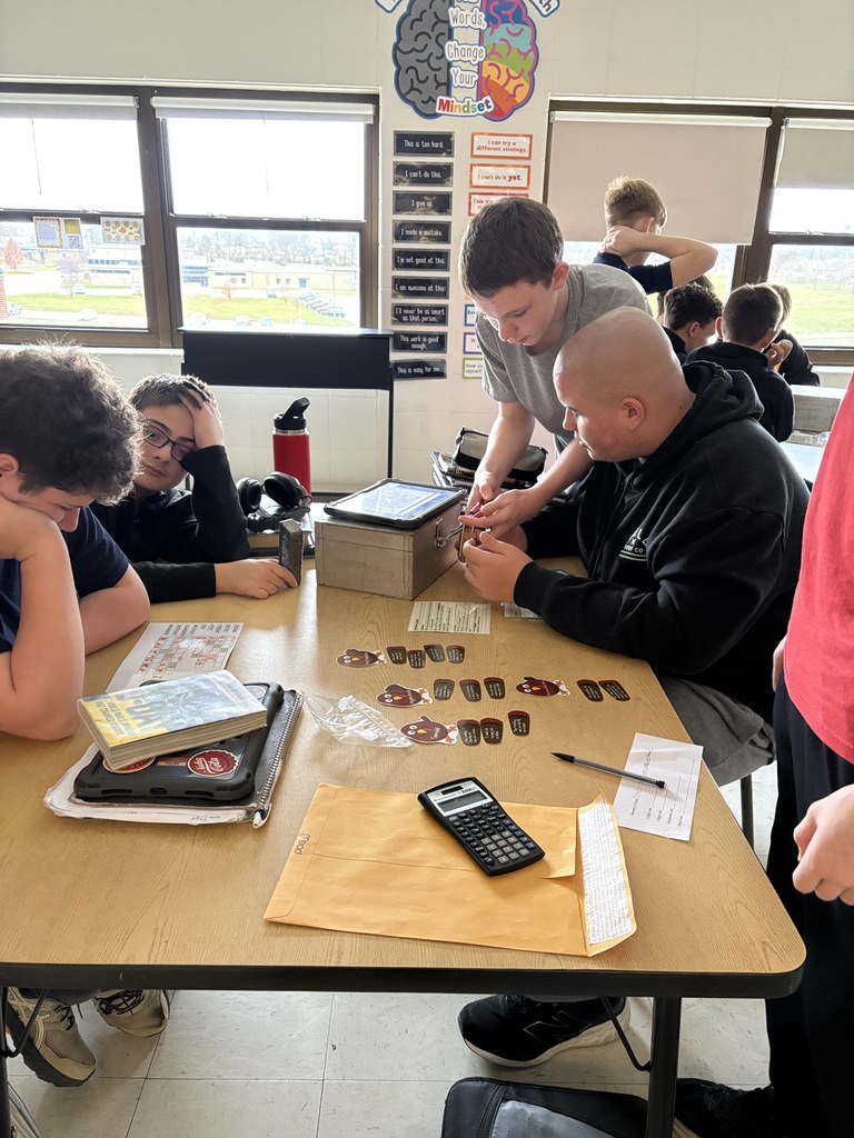 Ms. Morris class used clues to solve puzzles and unlock locks in an escape room like activity
