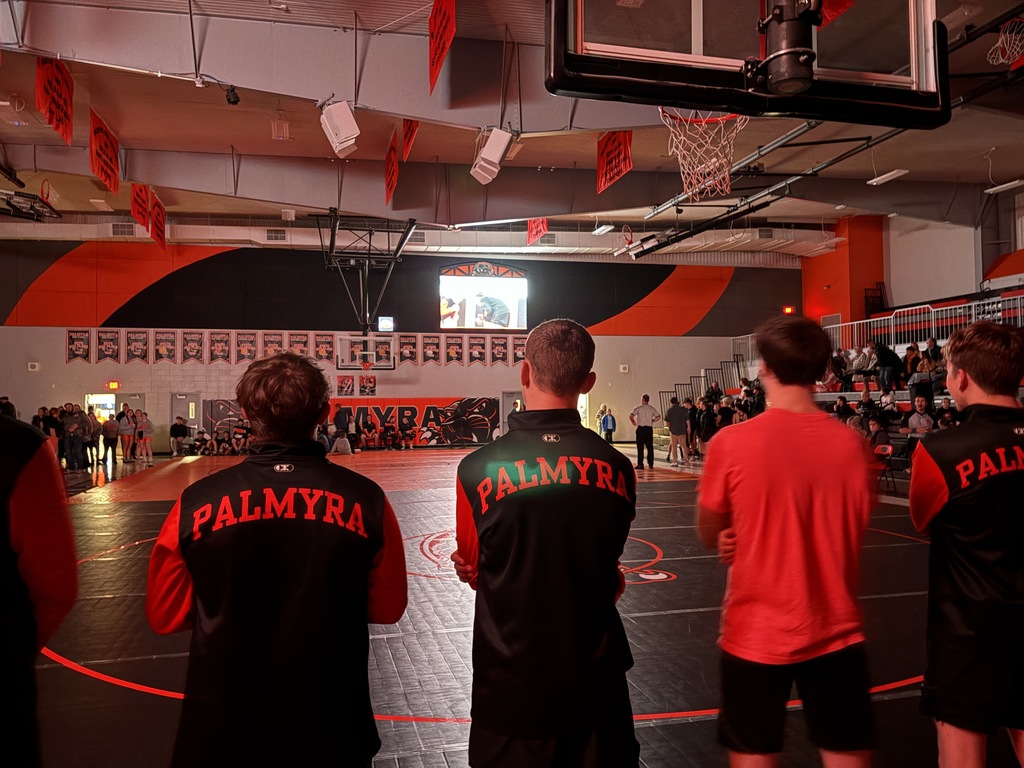 boys wrestling before meet