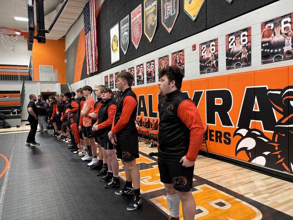 boys wrestling before meet