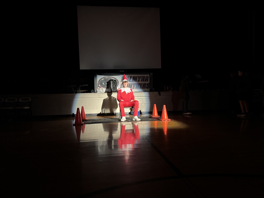 Mr Banta, the elf, being pie'd in the face