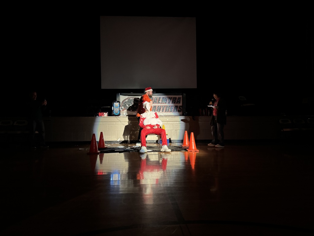 Mr Banta, the elf, being pie'd in the face