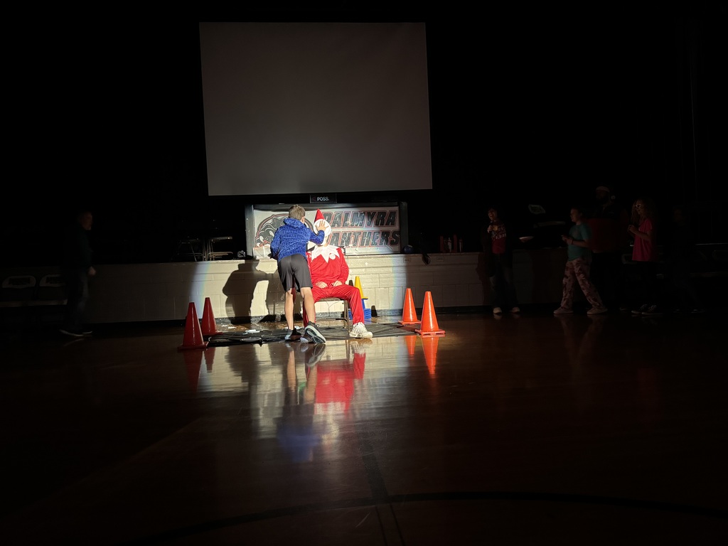 Mr Banta, the elf, being pie'd in the face