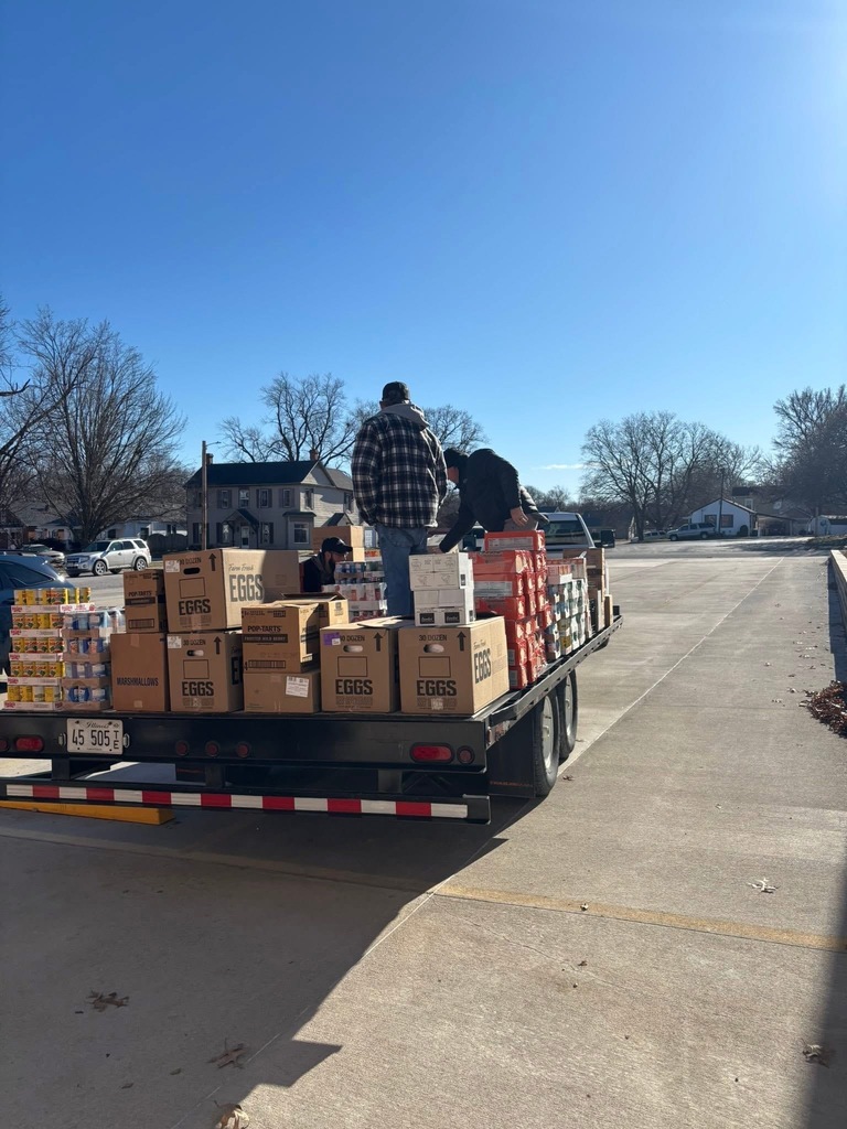 Basketball team helping with the adopt a familly program