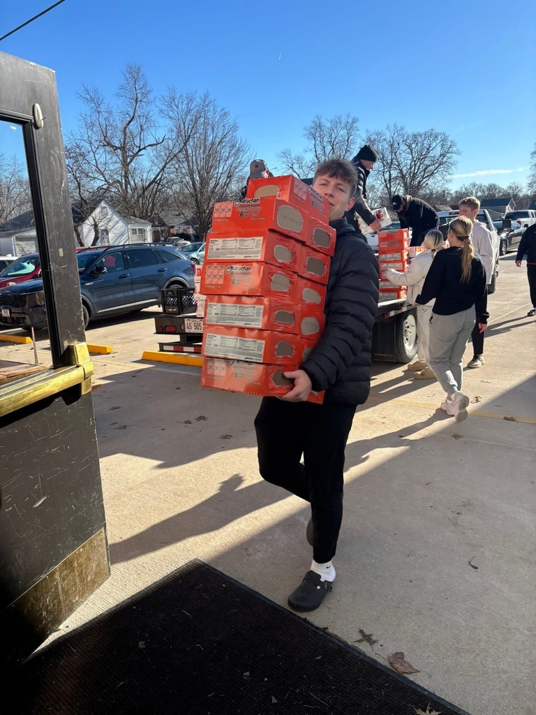 Basketball team helping with the adopt a familly program