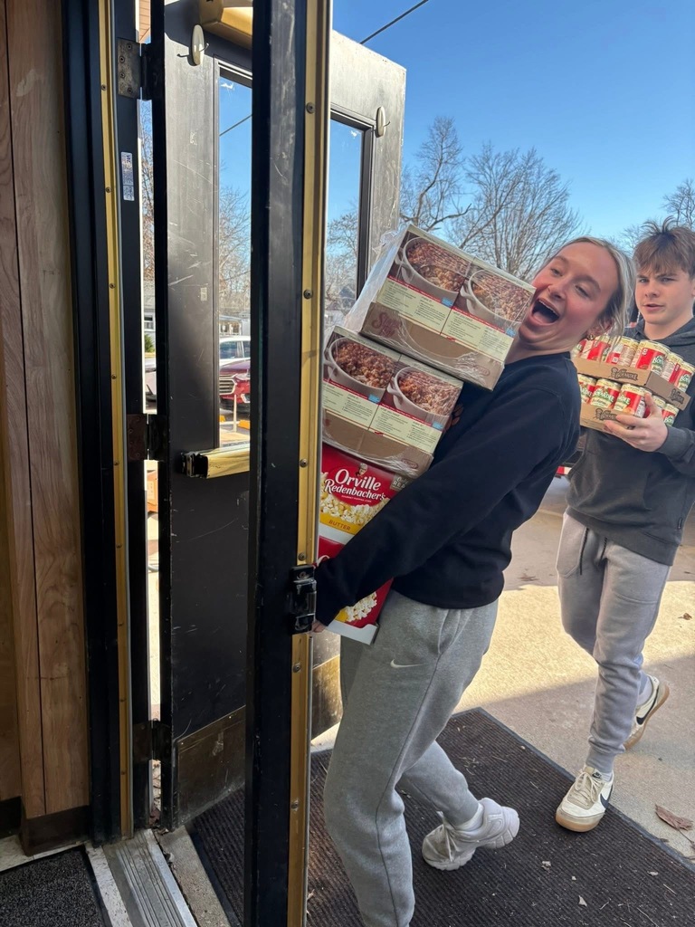 Basketball team helping with the adopt a familly program