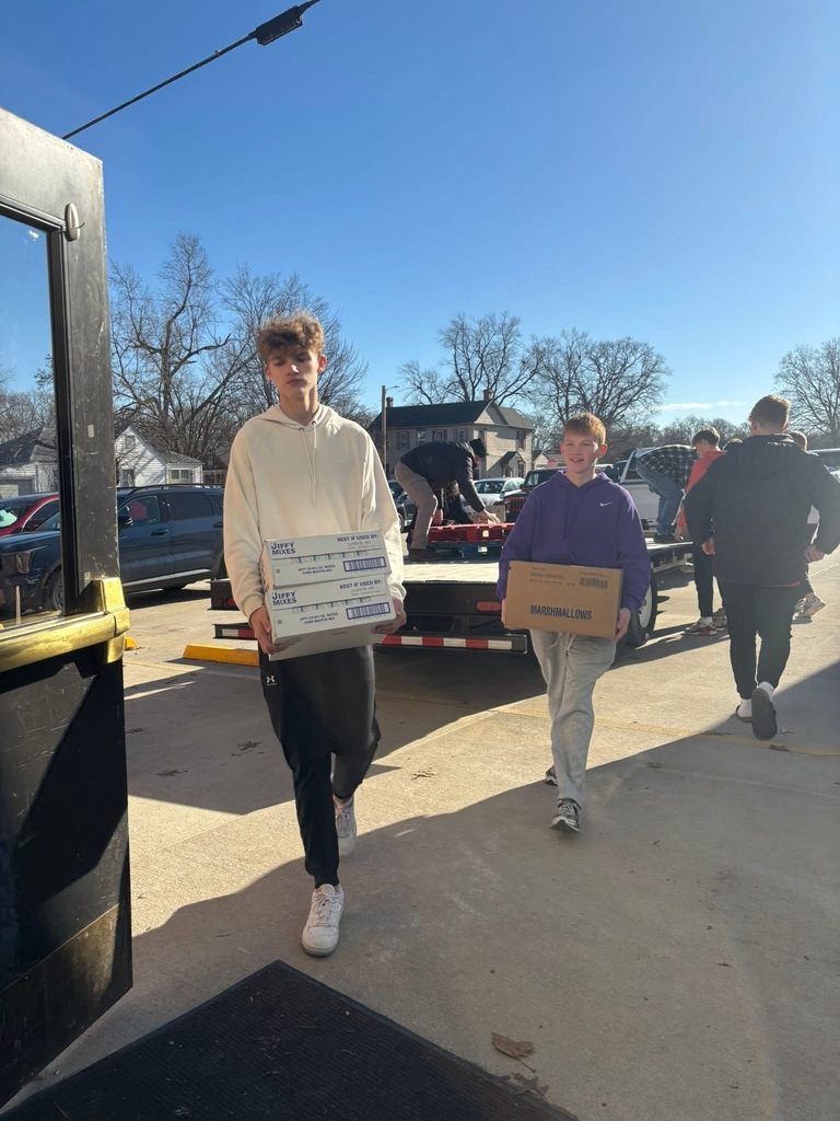 Basketball team helping with the adopt a familly program