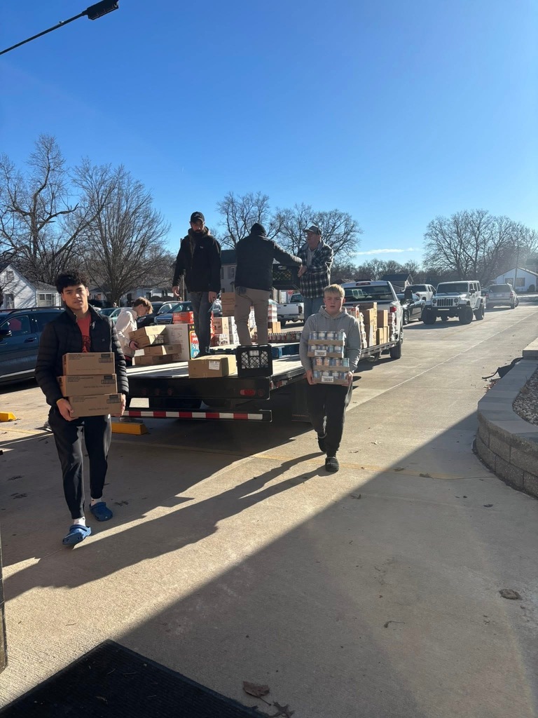 Basketball team helping with the adopt a familly program