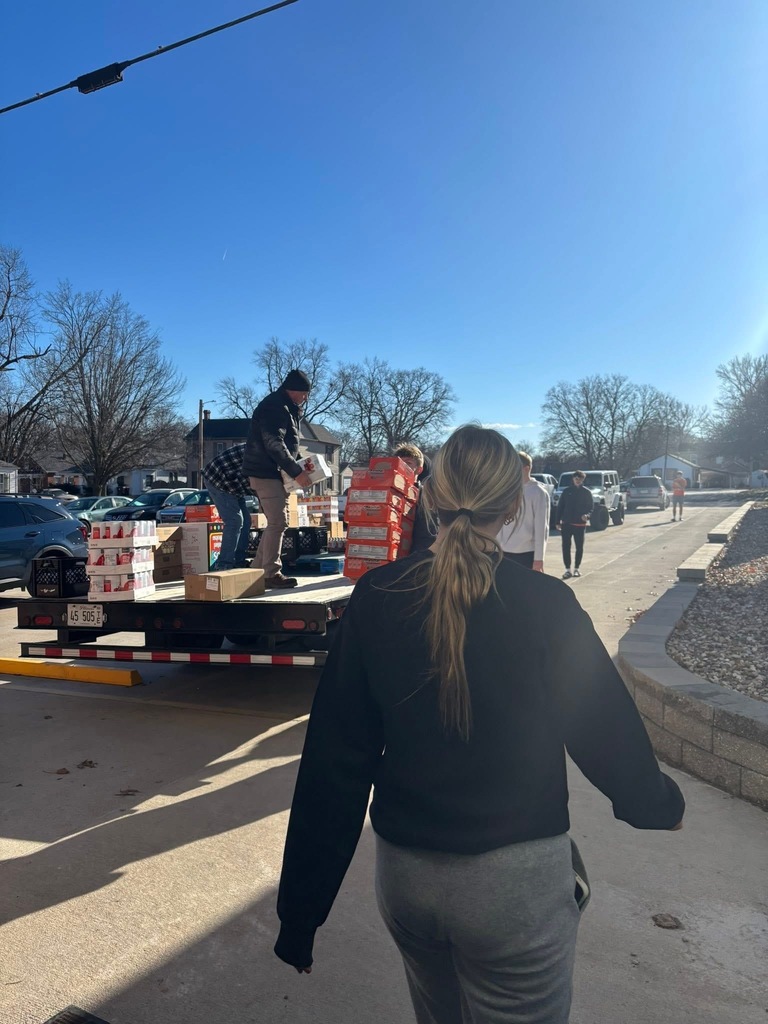 Basketball team helping with the adopt a familly program