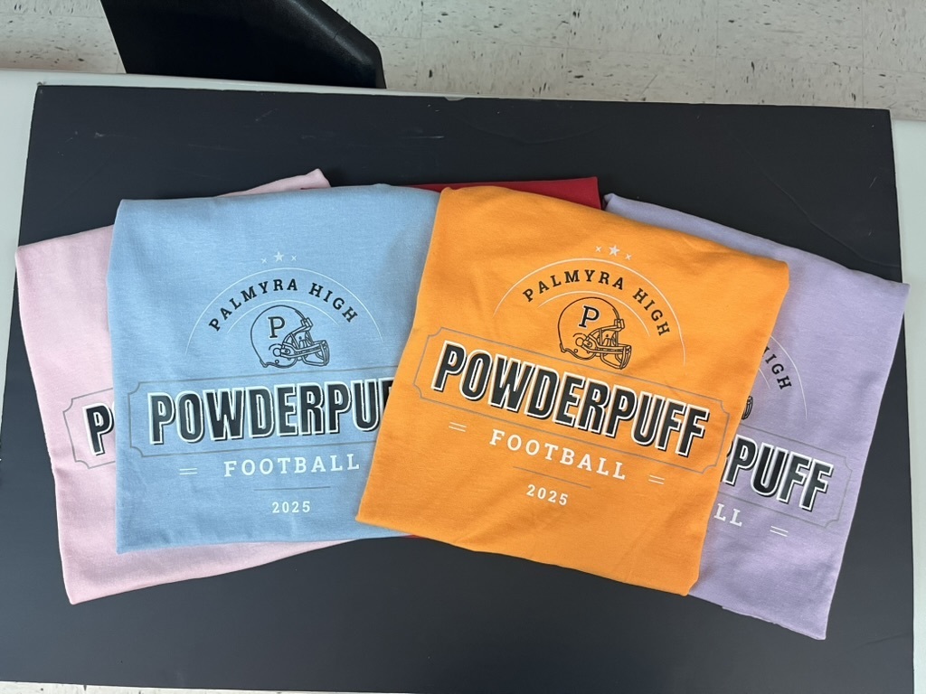 students making shirts for powderpuff homecoming rally