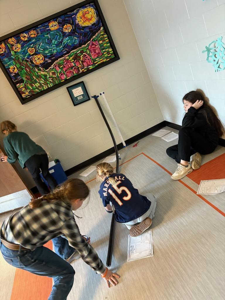 PES 4th grade science club meeting, learning about Marble Coasters