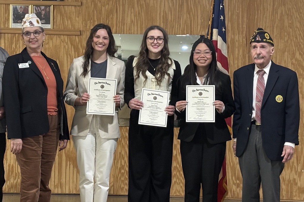 high school student, Tess was the winner of the oratorical contest and pictured with the American Legion officials