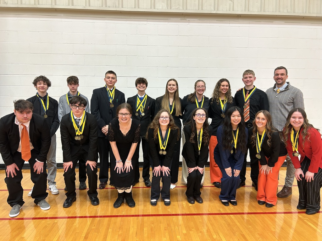FBLA members and advisor with their winning medals