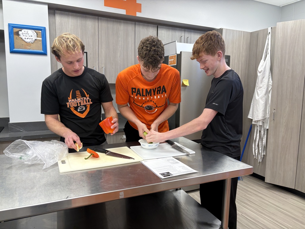 Foods class learns proper knife handling skills and make mango salsa