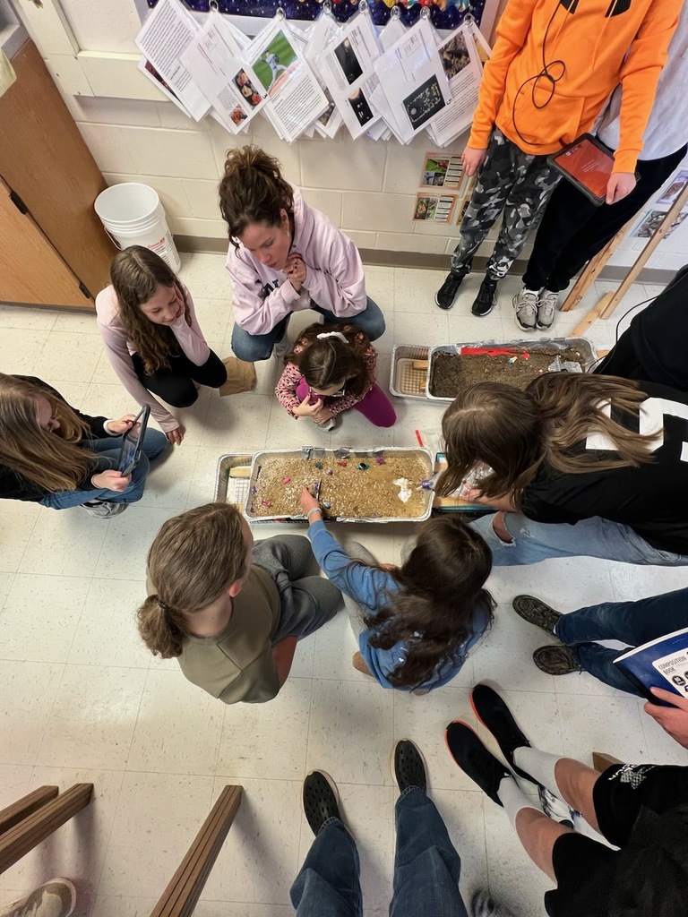 Middle school students studying erosion with lab activity
