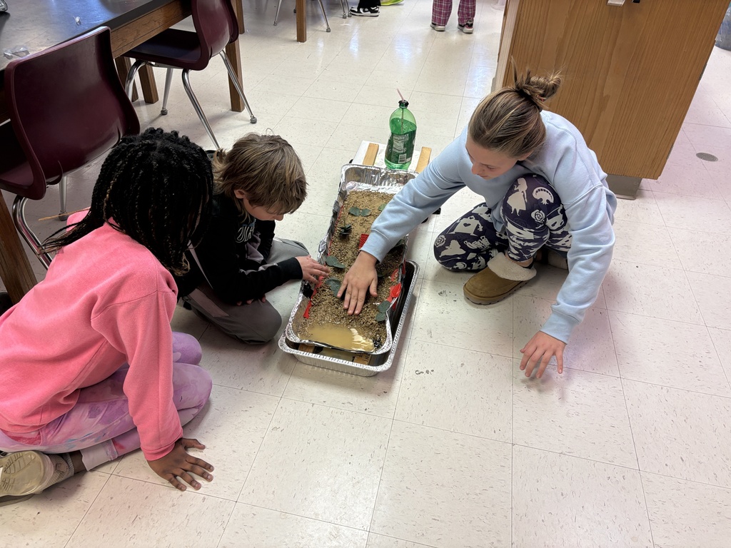 Middle school students studying erosion with lab activity