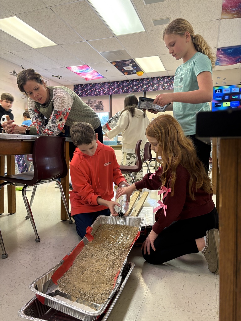 Middle school students studying erosion with lab activity