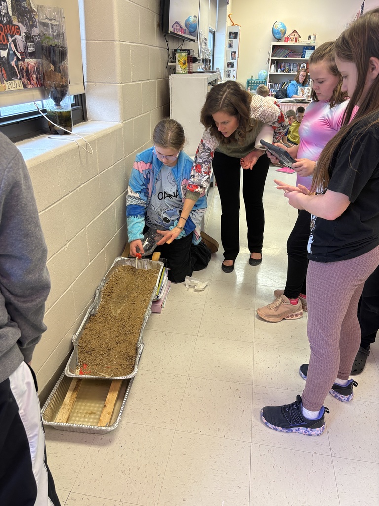 Middle school students studying erosion with lab activity