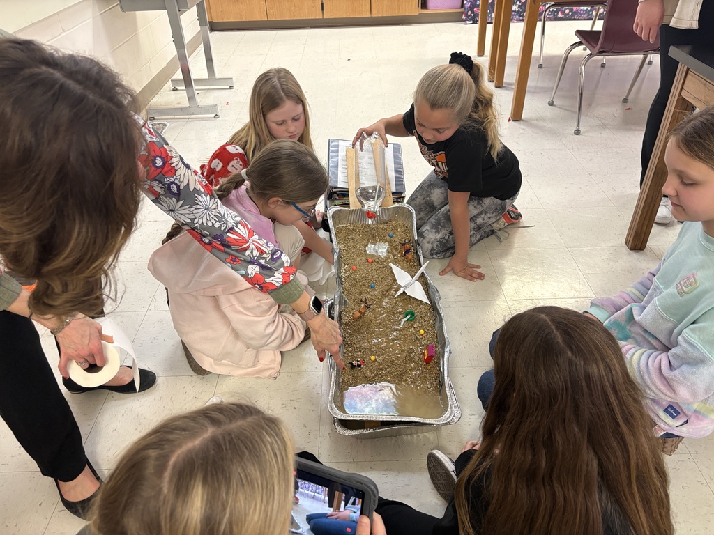 Middle school students studying erosion with lab activity