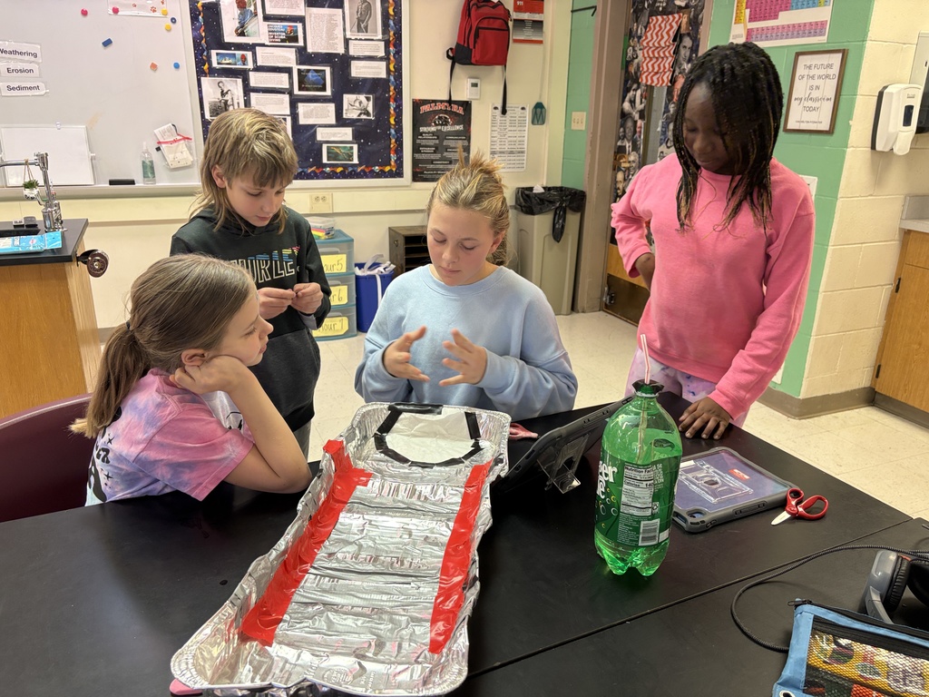 Middle school students studying erosion with lab activity
