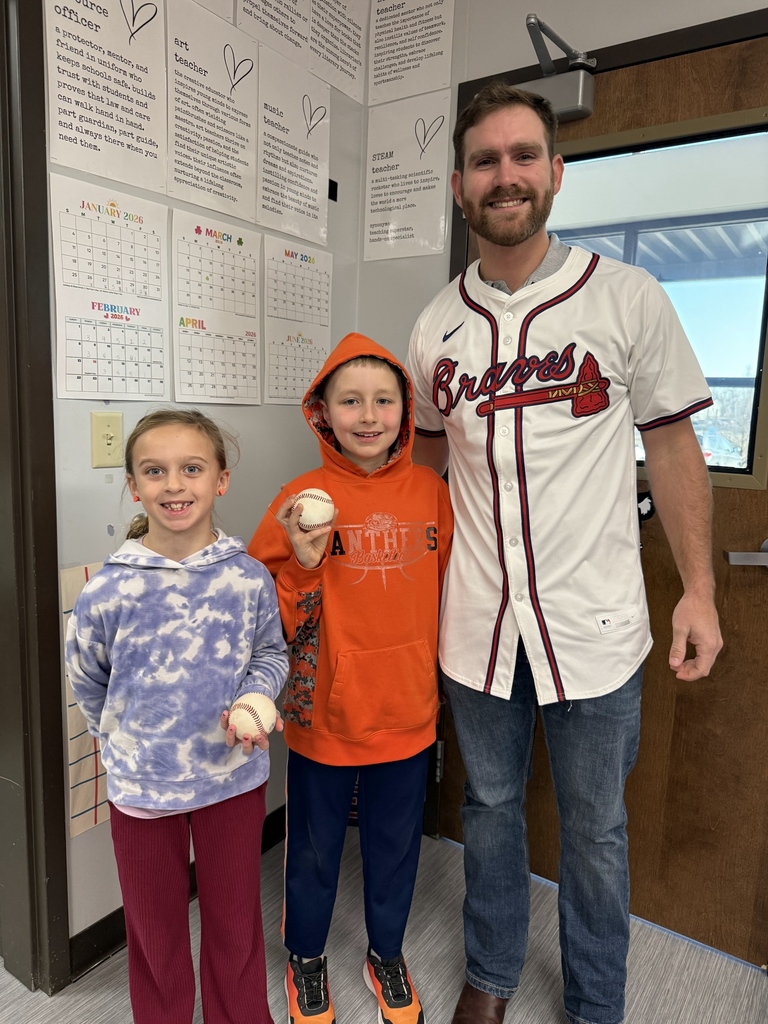 Students with Mr. Jacob and their baseballs