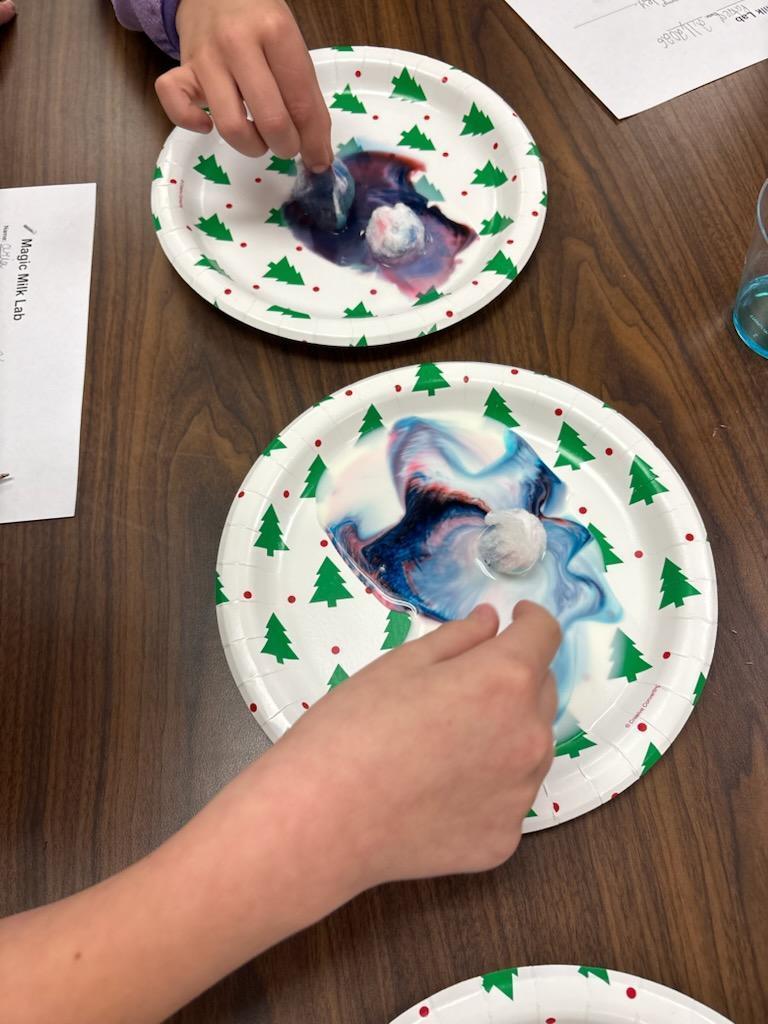 4th grade science club experimenting with milk