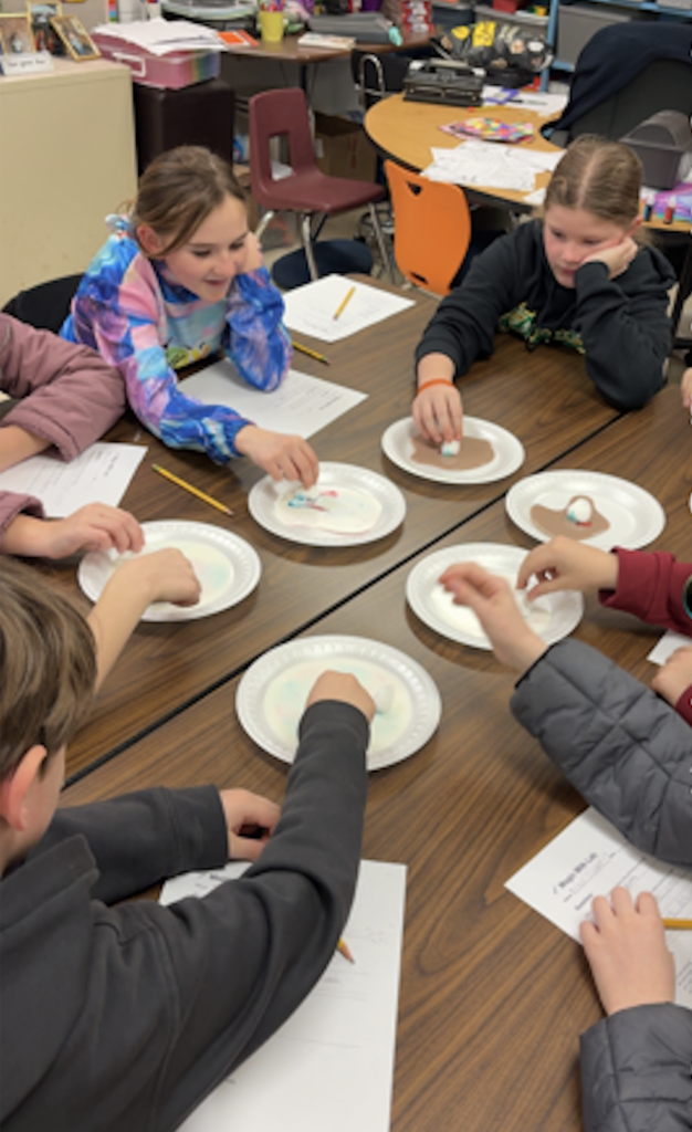 4th grade science club experimenting with milk