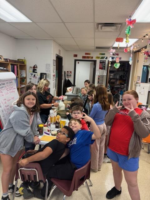 Students in Mrs. Eagan's class enjoying a cocoa lesson