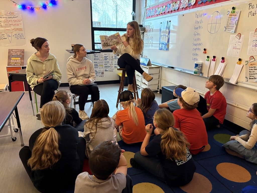 PHS Stuco students read to PES students