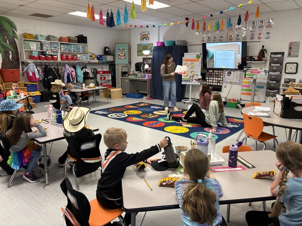 PHS Stuco students read to PES students