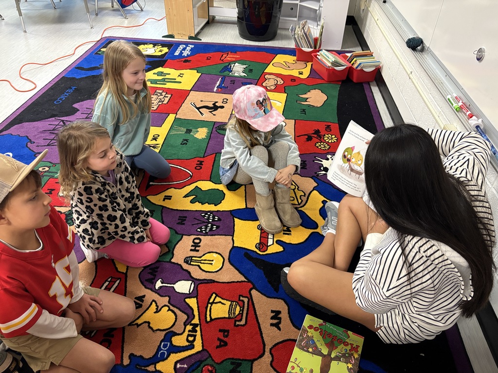 PHS Stuco students read to PES students