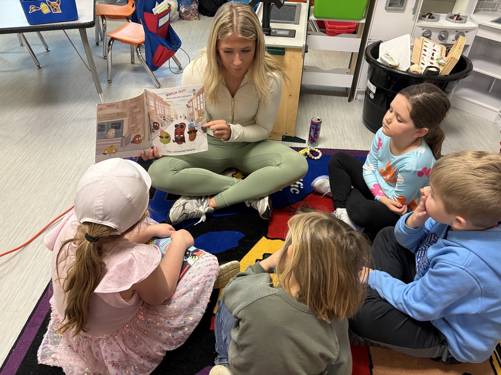 PHS Stuco students read to PES students