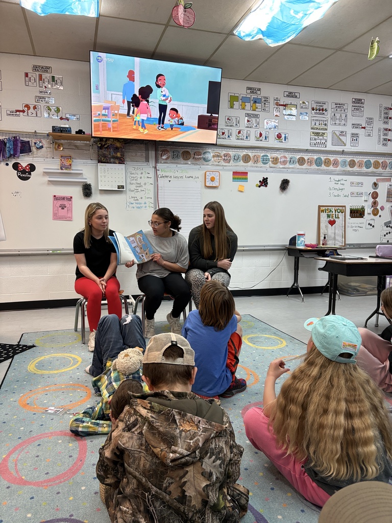 PHS Stuco students read to PES students