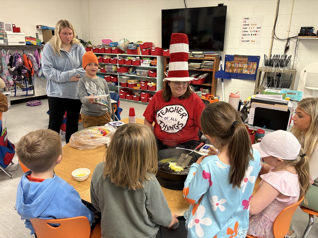 Mrs. Churchwell and kindergarten students making green eggs and ham