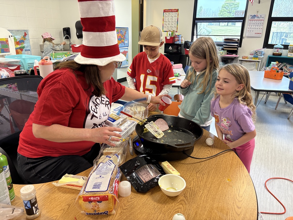 Mrs. Churchwell and kindergarten students making green eggs and ham