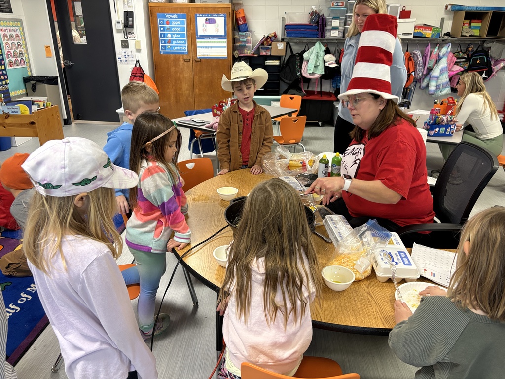 Mrs. Churchwell and kindergarten students making green eggs and ham