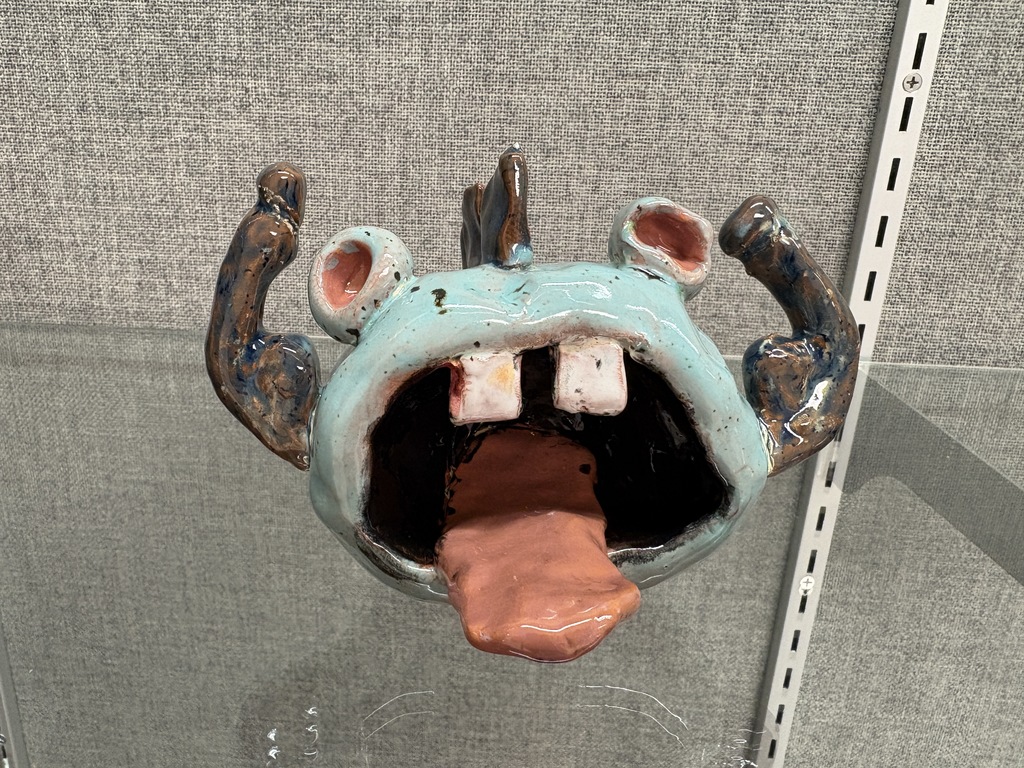 Intro to art high school students pinch pot monsters