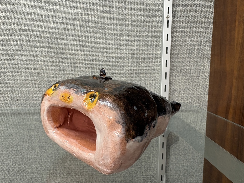 Intro to art high school students pinch pot monsters