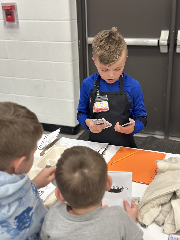 2nd grade open house students with their restaurant