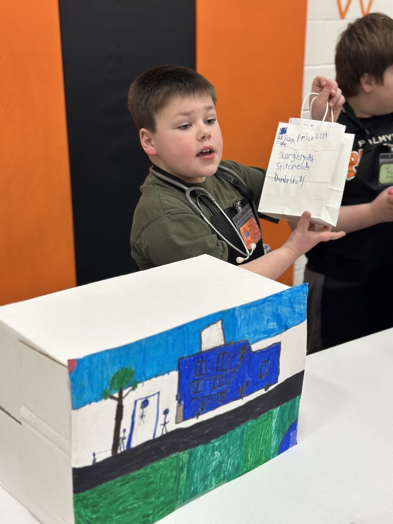 2nd grade open house students with their restaurant