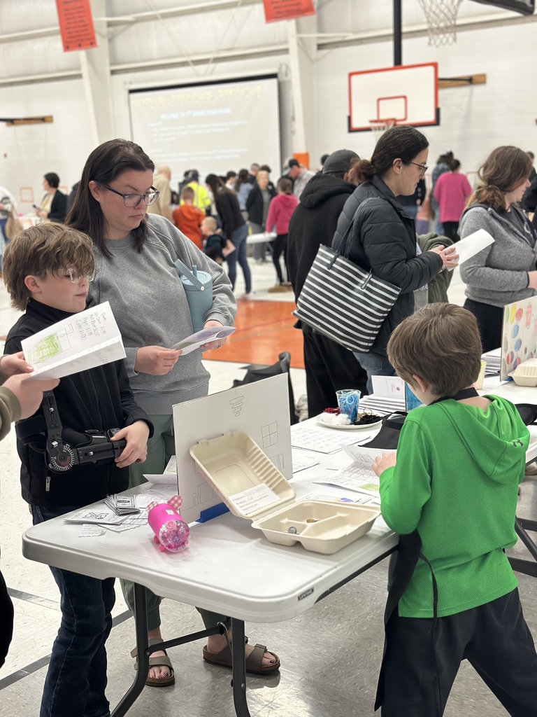 2nd grade open house students with their restaurant