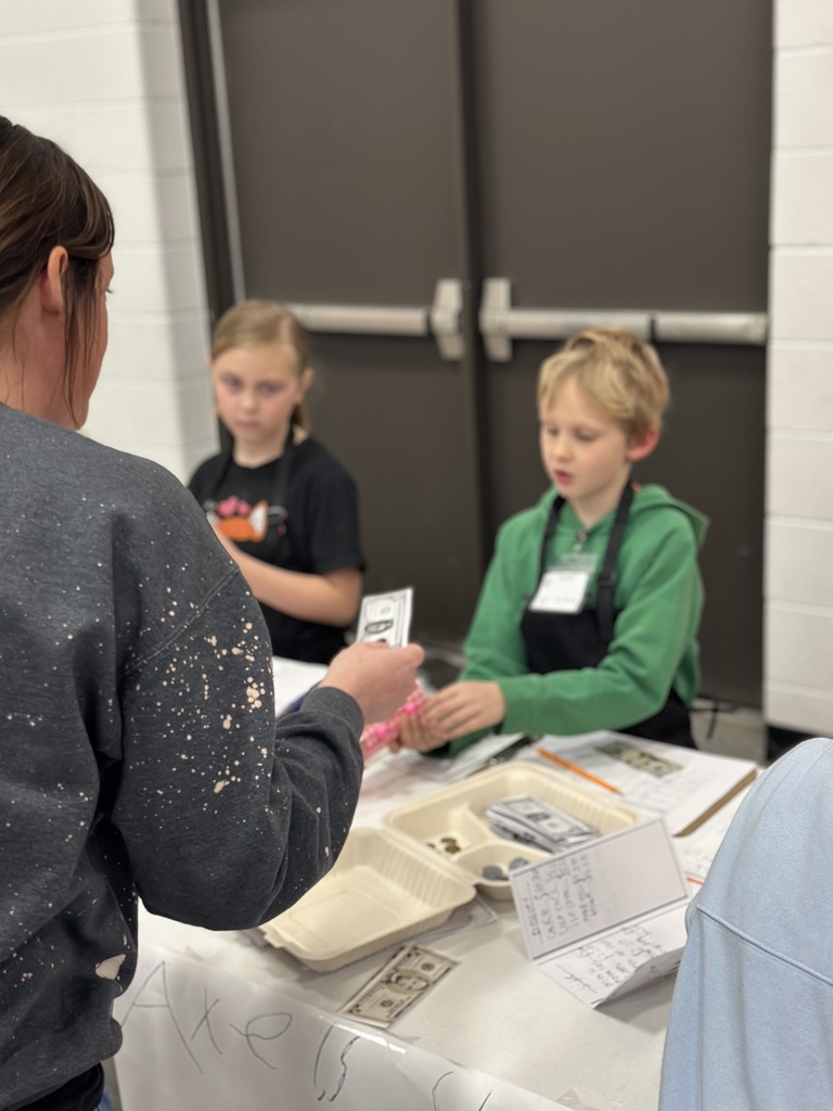 2nd grade open house students with their restaurant