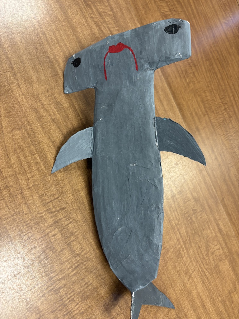 papier mache sharks created by earth science students