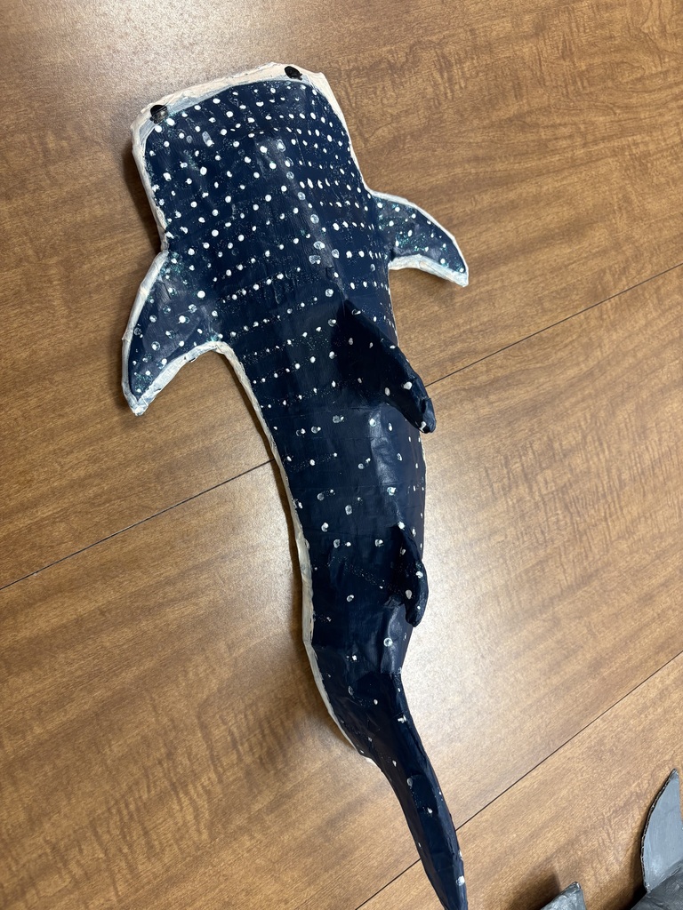 papier mache sharks created by earth science students