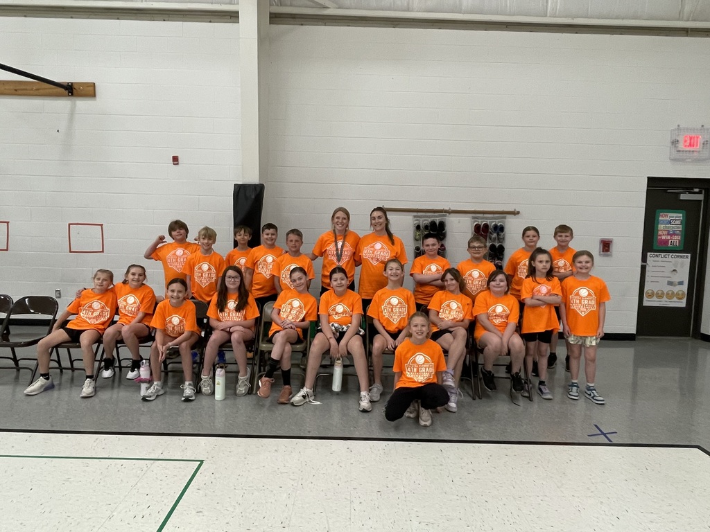 Mrs Dudley's 4th grade basketball team and class